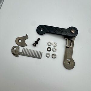 Black Carbon Fiber and Silver Titanium Key Holder by KeyBar